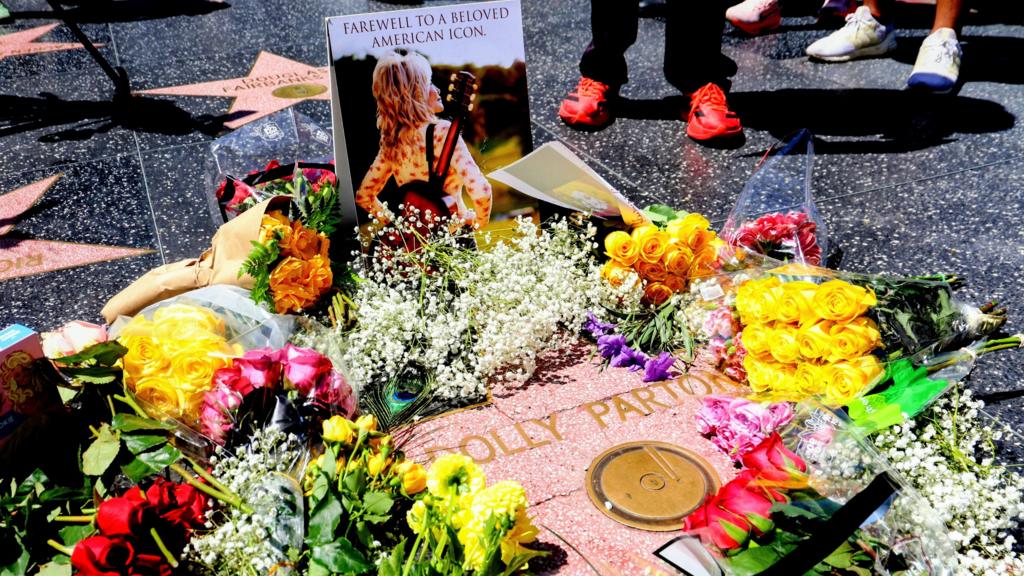 Flowers are laid on Dolly Parton's star on The Hollywood Walk of Fame