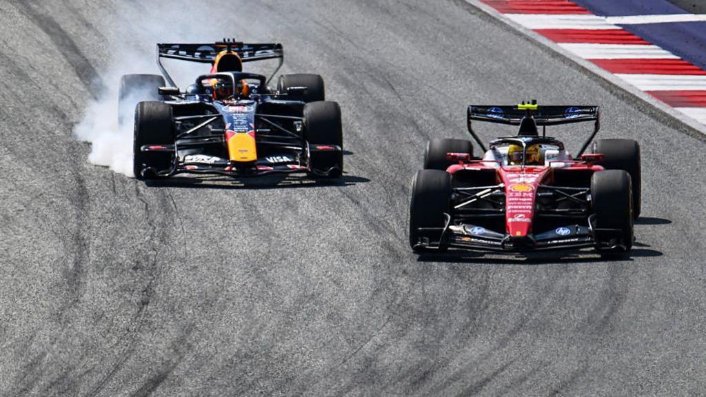 Max Verstappen and Lewis Hamilton battle for position on track in Spielberg 