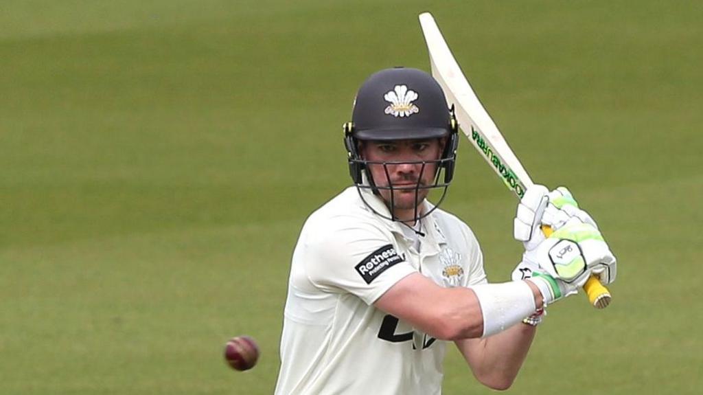 Rory Burns plays a shot for Surrey against Leicestershire at the Kia Oval on 10 April 2026.