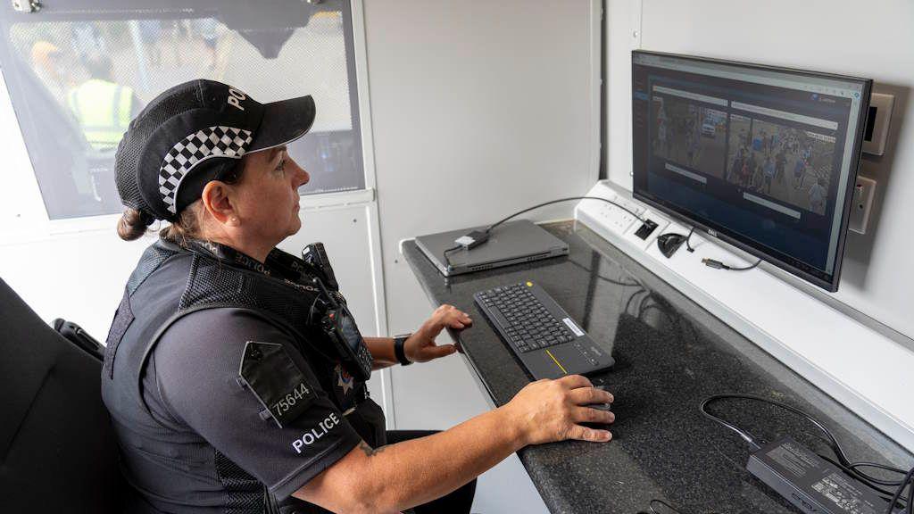 An Essex Police officer operating the live facial recognition technology during the Clacton Airshow