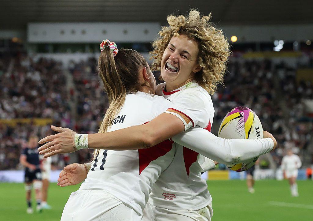England's Jess Breach celebrates with teammate Ellie Kildunne after scoring her team's tenth try during the Women's Rugby World Cup 2025 Pool A match versus USA at the Stadium of Light in Sunderland, England. Photo by Ian MacNicol
