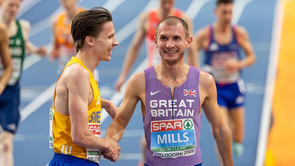 Great Britain's George Mills wins his 3,000m heat on Saturday