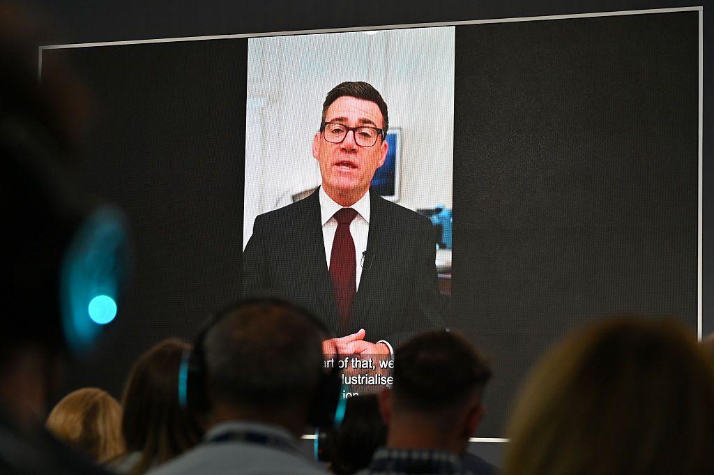 A pre-recorded message by UK Prime Minister Andy Burnham is played prior a speech by Defence Secretary Wes Streeting during the Farnborough International Air Show 2026