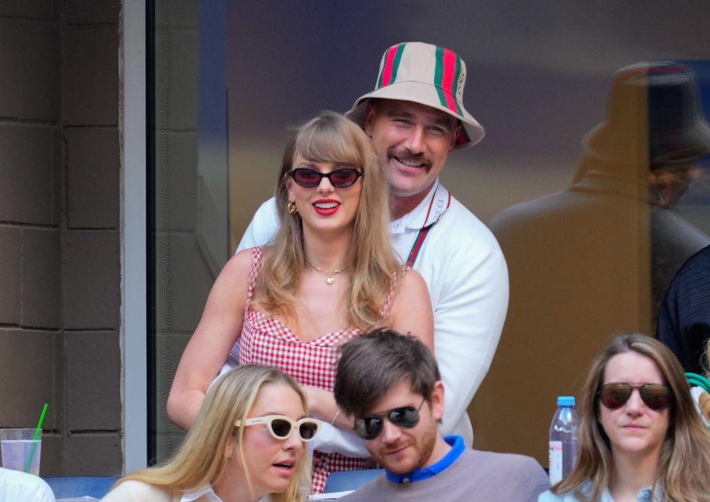 Travis Kelce cuddles Taylor Swift