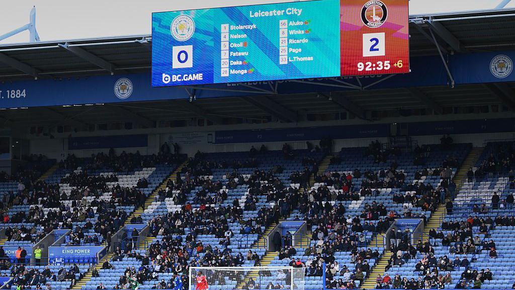 The scoreboard at the King Power Stadium reading: Leicester 0-2 Charlton