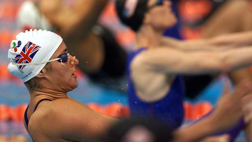Sarah Storey gets ready to start a swimming race