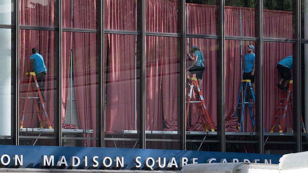 Blush-pink coloured curtains being hung at Madison Square Garden
