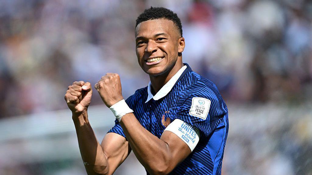 Mbappé celebrating after scoring.