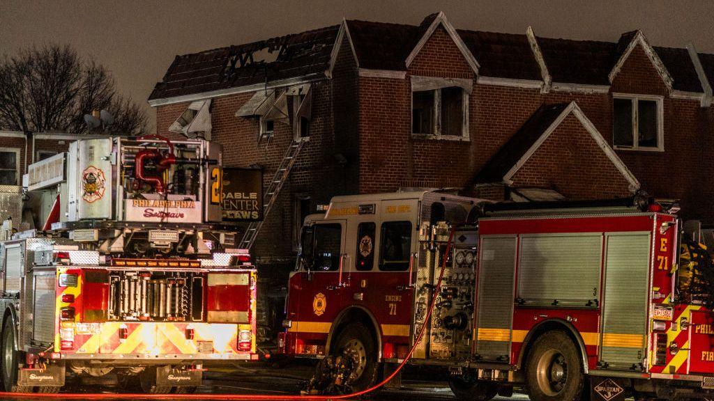 Medical plane carrying six crashes into Philadelphia neighbourhood, as number of casualties unknown