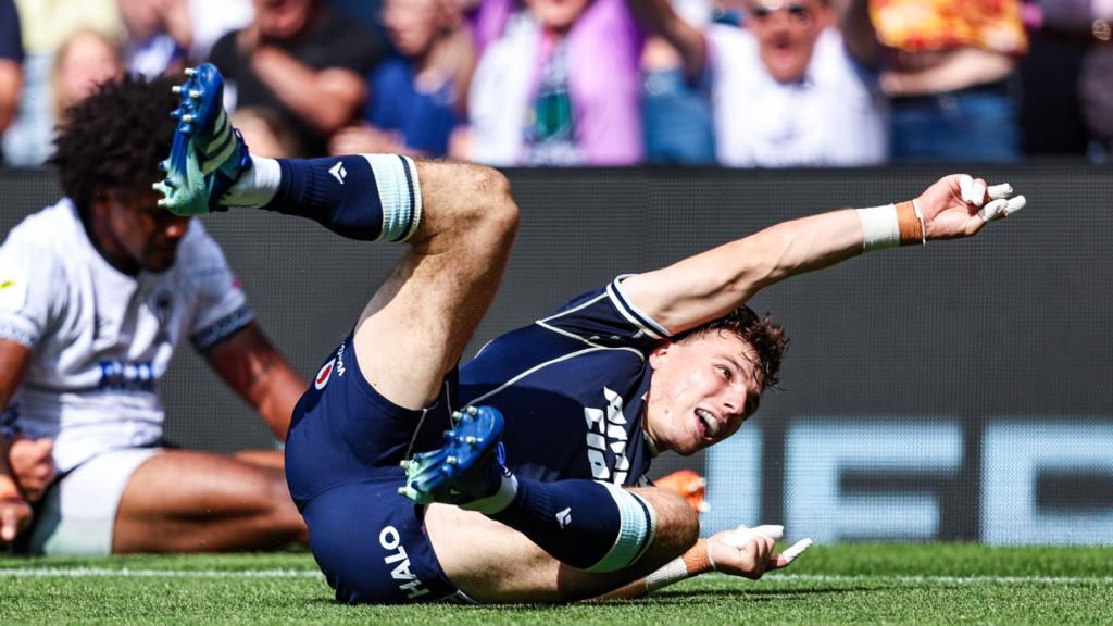 Scotland's Jamie Dobie scores a try