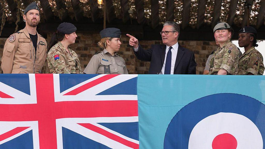 Sir Keir Starmer meets uniformed aircrew members during a visit to Taif Airbase in Saudi Arabia, 8 April.  