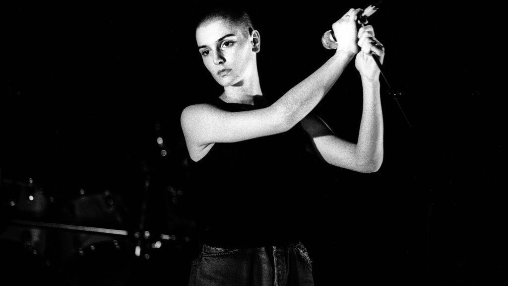 Irish singer Sinead O'Connor performs at Paradiso, Amsterdam, Netherlands, 16 March 1988. (Photo by Paul Bergen/Redferns)