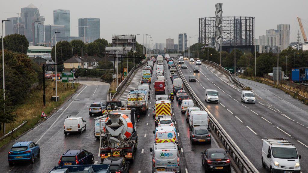 An image showing queues of cars approaching the Blackwall Tunnel in London