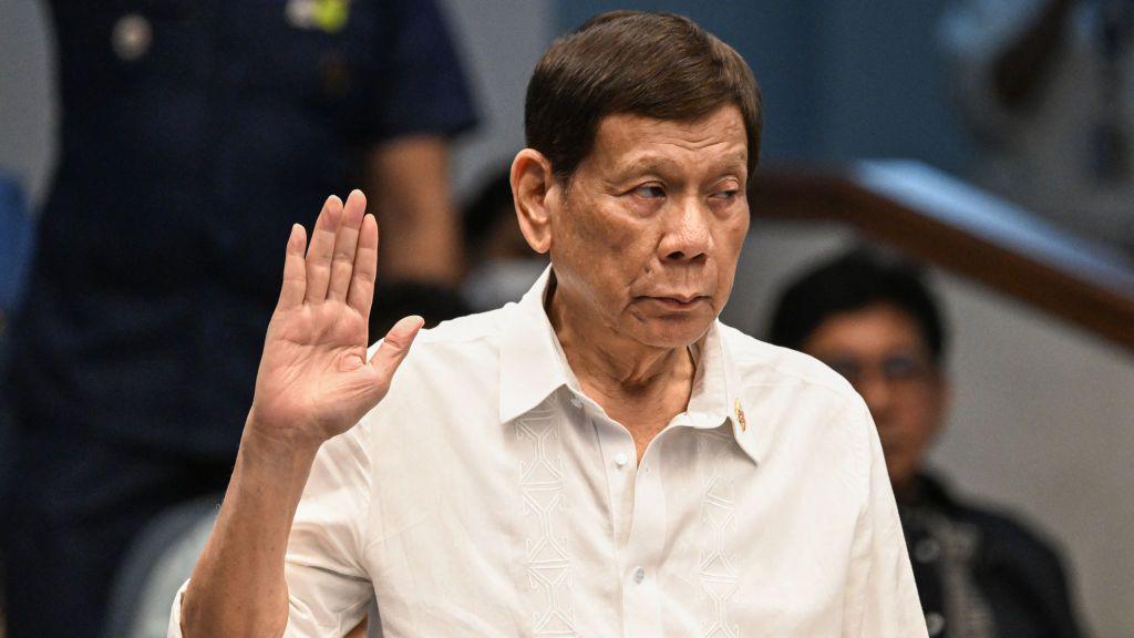 Rodrigo Duterte takes an oath as he attends a senate probe on the drug war during his administration, in Manila on 28 October 2024.