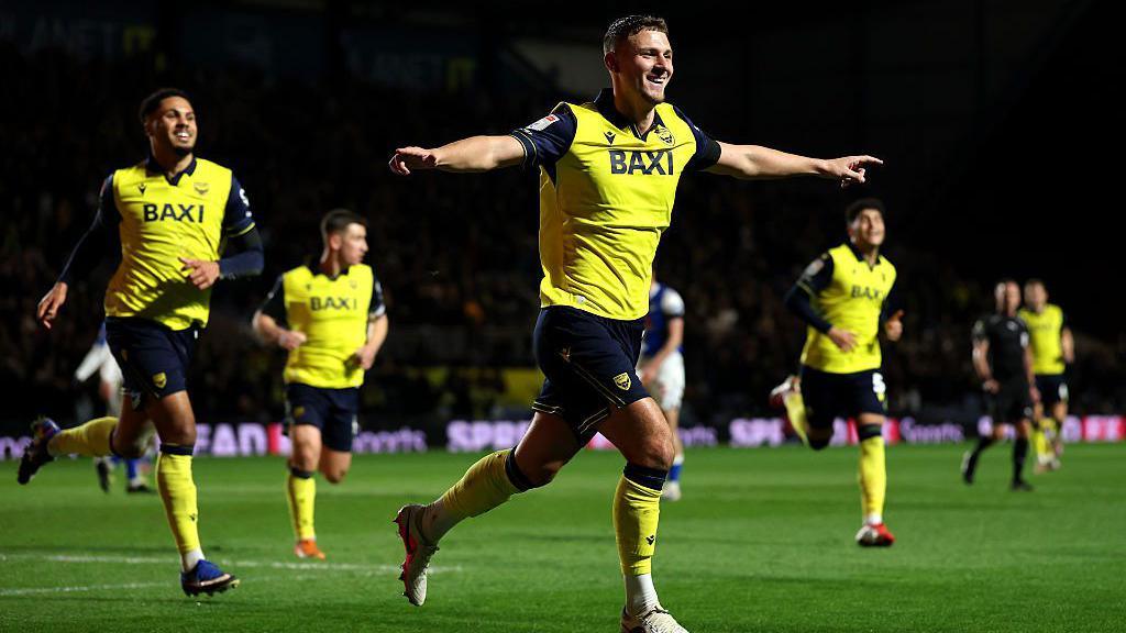 Jamie Donley celebrates after scoring his first goal for Oxford