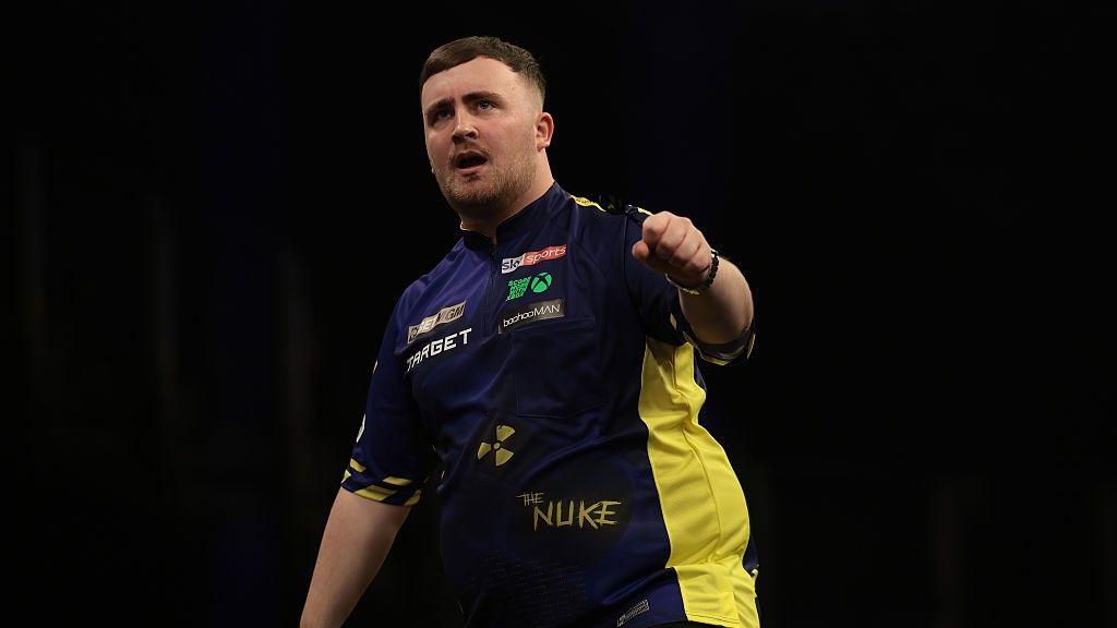 Luke celebrates a checkout
