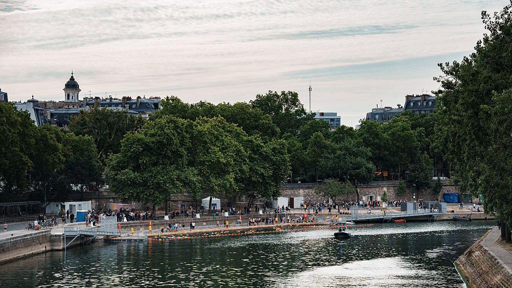 Swimmers in the River Seine.