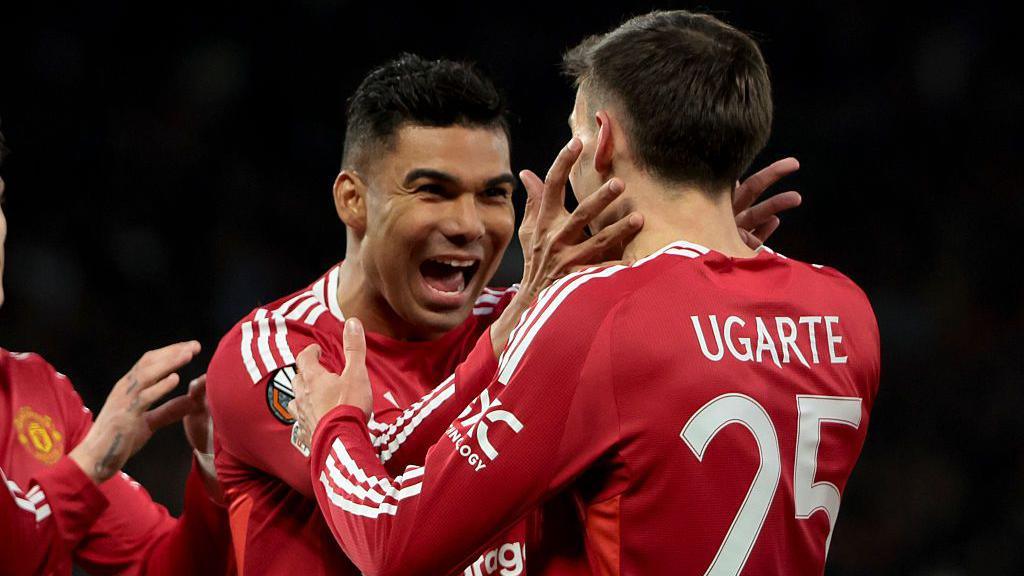 Casemiro and Manuel Ugarte celebrating a Man Utd goal
