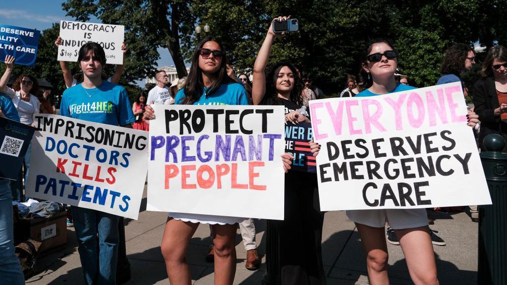 Protesters at the Supreme Court on 28 June