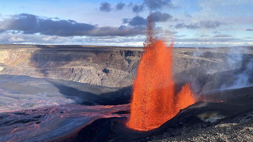  Lava fountains rise over 500 feet above the western rim of Halemaumau crater during the ongoing 25th eruptive episode of the Klauea summit eruption in Hawaii, United States, on June 11, 2025