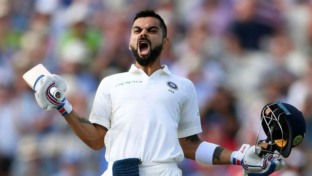 India batsman Virat Kohli celebrates his century during day two of the First Specsavers Test Match between England and India at Edgbaston on August 2, 2018 in Birmingham, England.