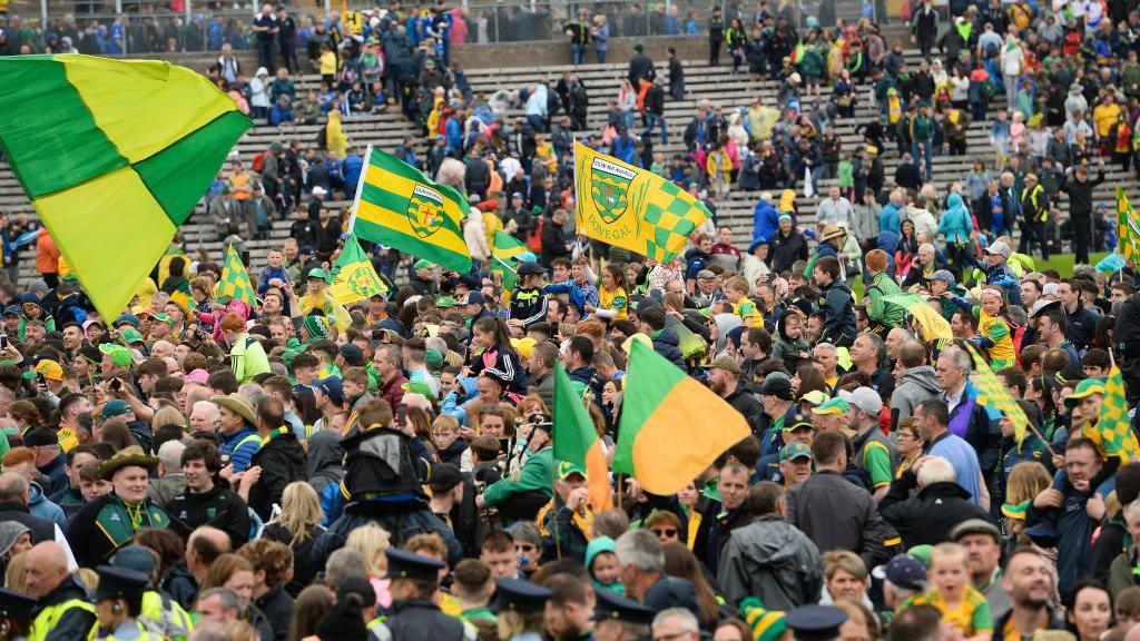 Fans on the pitch at St Tiernach’s Park