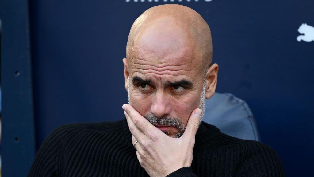 Pep Guardiola looks on during Manchester City v Fulham