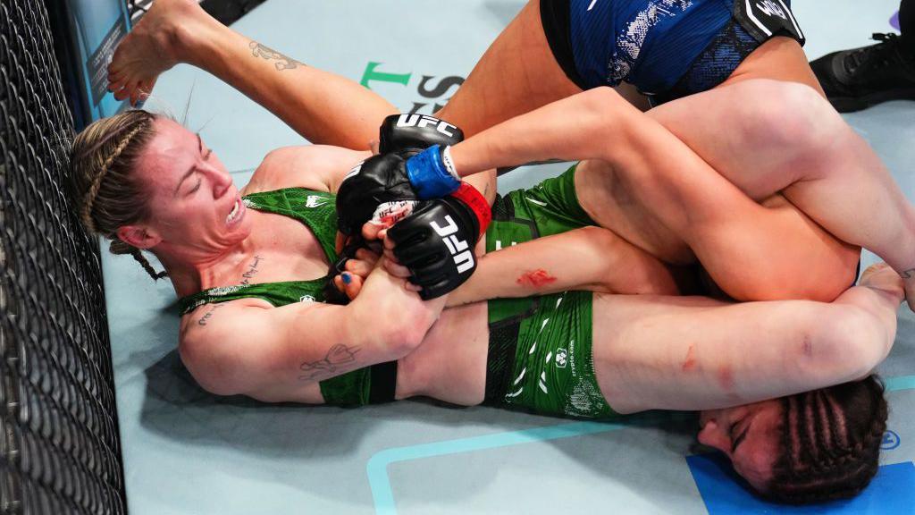 Molly McCann submits Diana Belbita with an armbar