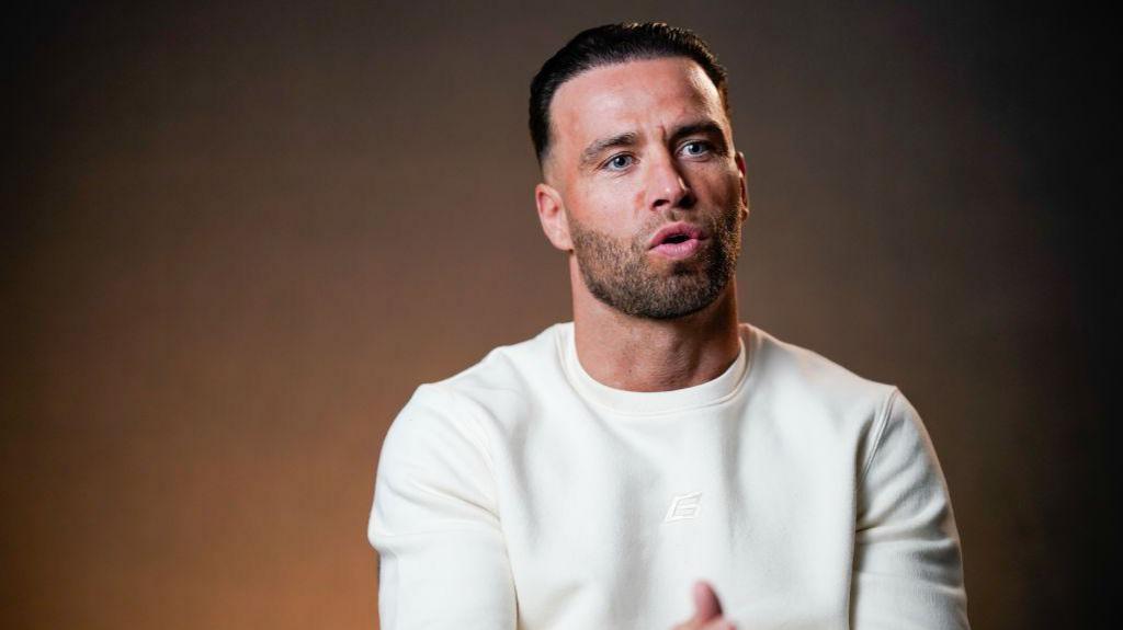 Felix Cash speaks to media at a fight week event