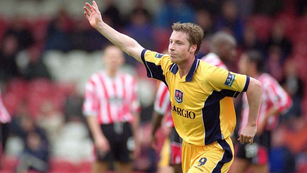 Neil Harris celebrates after scoring for Millwall in 2000