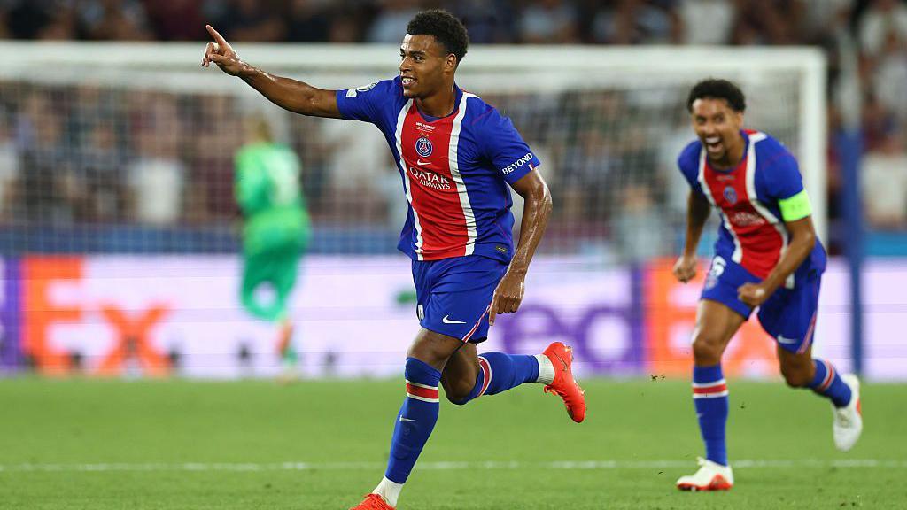 Desire Doue celebrates scoring for PSG in the Uefa Super Cup against Aston Villa