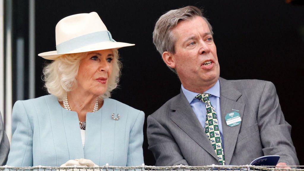 Queen Camilla and Joe Saumarez Smith, who is stepping down as chair of the British Horseracing Authority, attend Ladies' Day at the 2024 Epsom Derby Festival