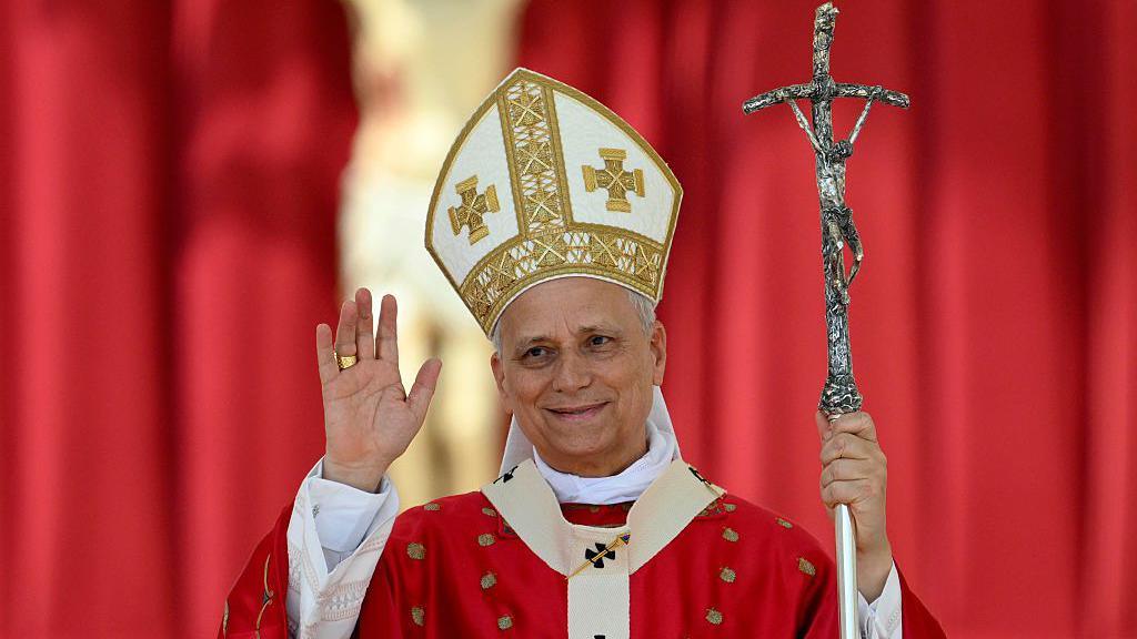 Pope Leo XIV waves to the faithful during the Mass for the Solemnity of Pentecost at St. Peter's Square in Vatican City in 2025.