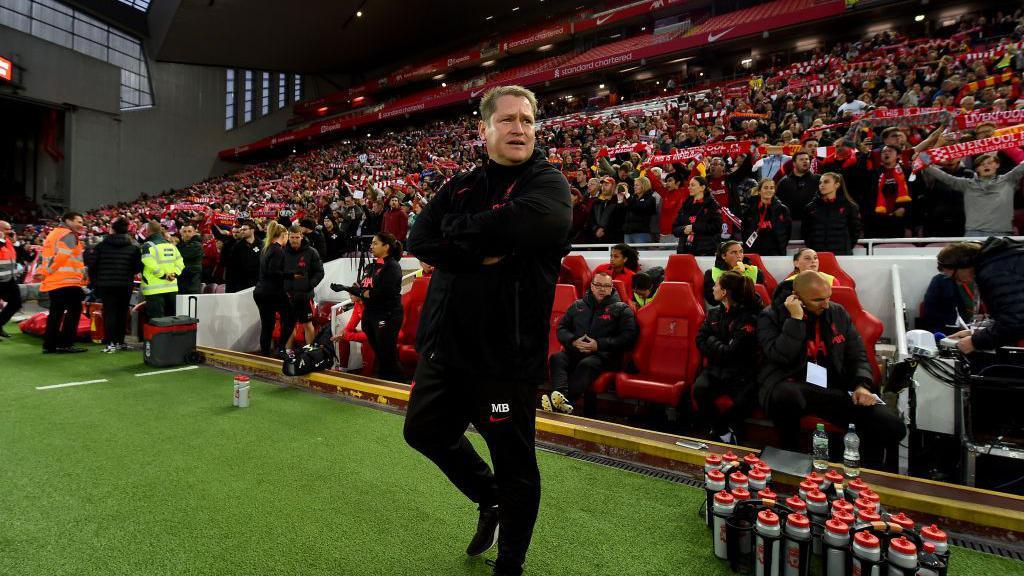 Matt Beard on the touchline at Anfield
