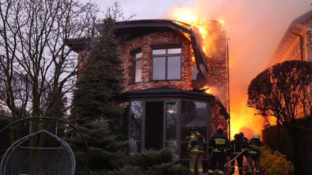 Firefighters work at the site of a Russian missile strike in Dnipro, Ukraine November 21, 2024