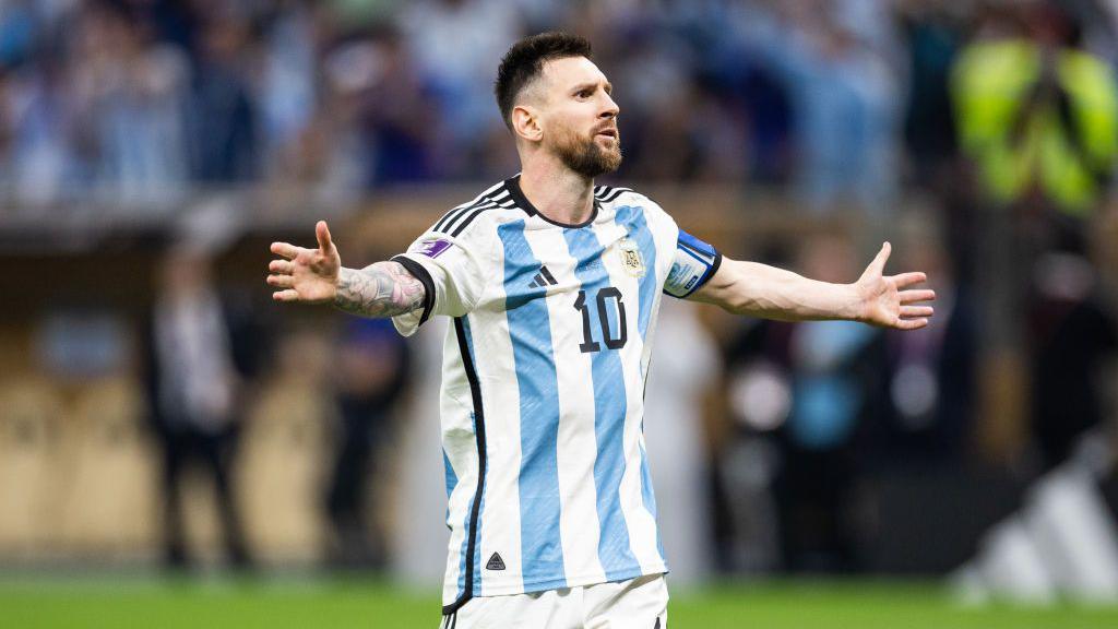 Lionel Messi celebrates his World Cup final shootout penalty against France