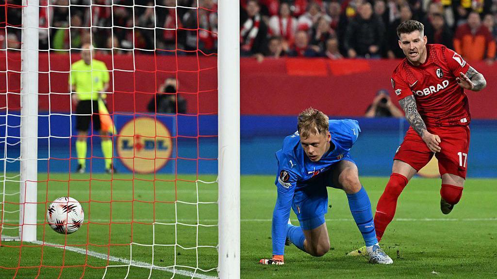 Lukas Kubler scores for Freiburg against Braga in the teams' Europa League semi-final, second leg