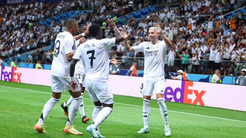 Federico Valverde of Real Madrid celebrates with his teammates after scoring a goal to make it 1-0