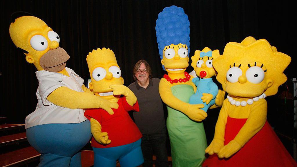 Creator Matt Groening poses with Simpson characters at "The Simpsons" Panel during the 2008 Comic Con at the San Diego Convention Center on July 26, 2008 in San Diego, California