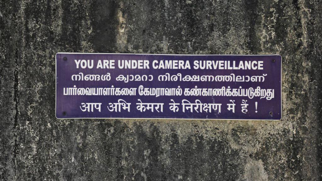'You are under camera surveillance' sign on a wall in Padmanabhapuram, Tamil Nadu, India on February 12, 2020.
