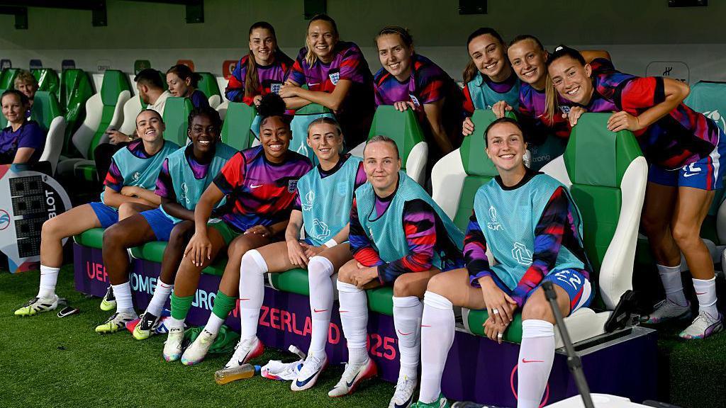 The England subs including Lotte Wubben-Moy, Beth Mead, Chloe Kelly, Khiara Keating, Michelle Agyemang and Grace Clinton on the bottom row.