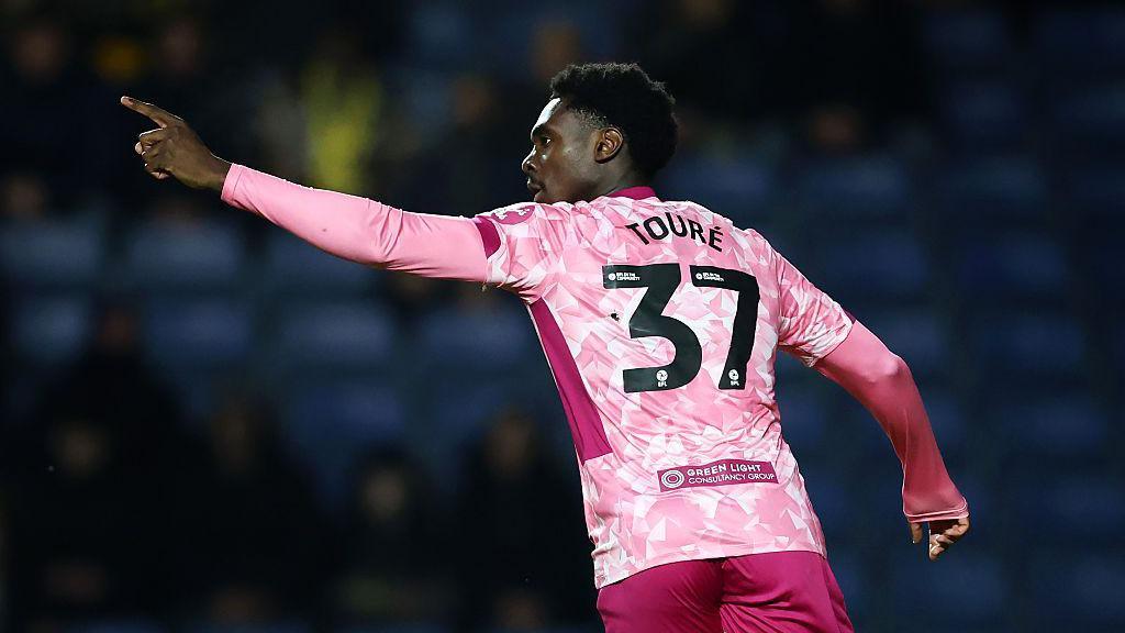 Mohamed Toure celebrates after scoring for Norwich 