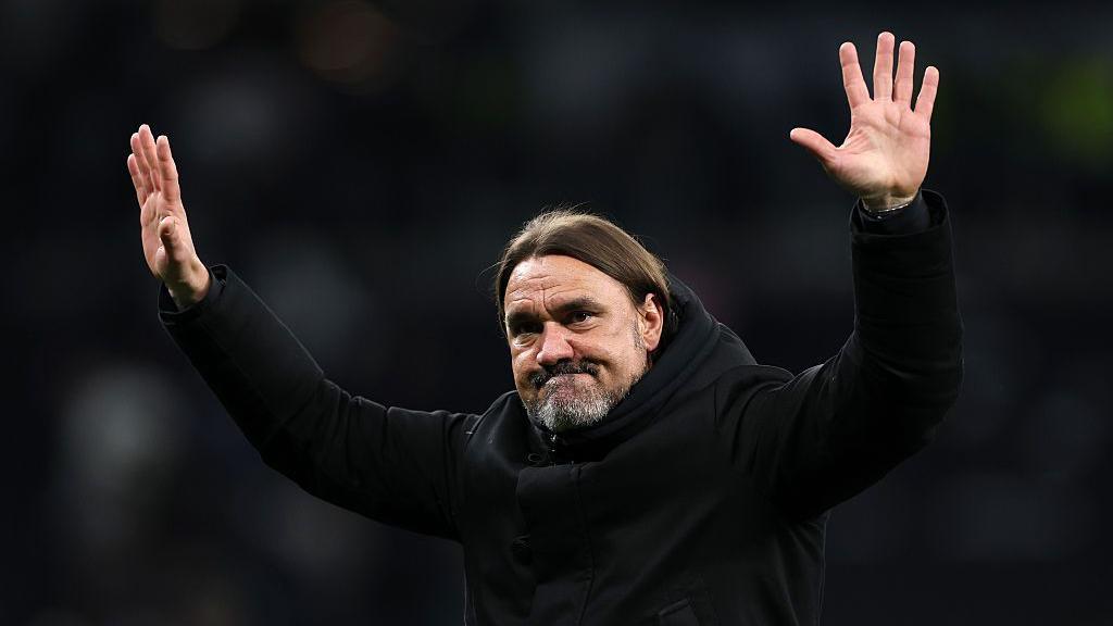 Daniel Farke holds his arms outstretched