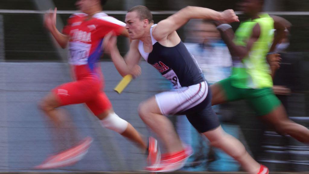 Athletes compete during the semifinal of the 4x400m Relay in the Deaflympics, in Caxias do Sul, Brazil, on May 13, 2022.