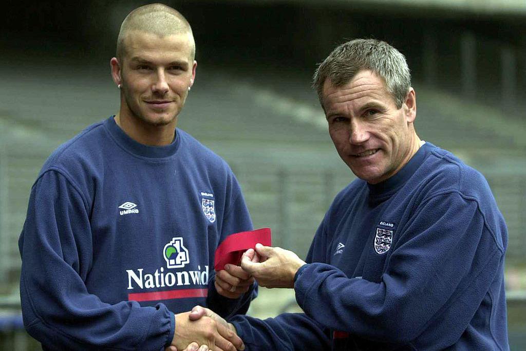 David Beckham is presented with the England armband by Peter Taylor in 2000