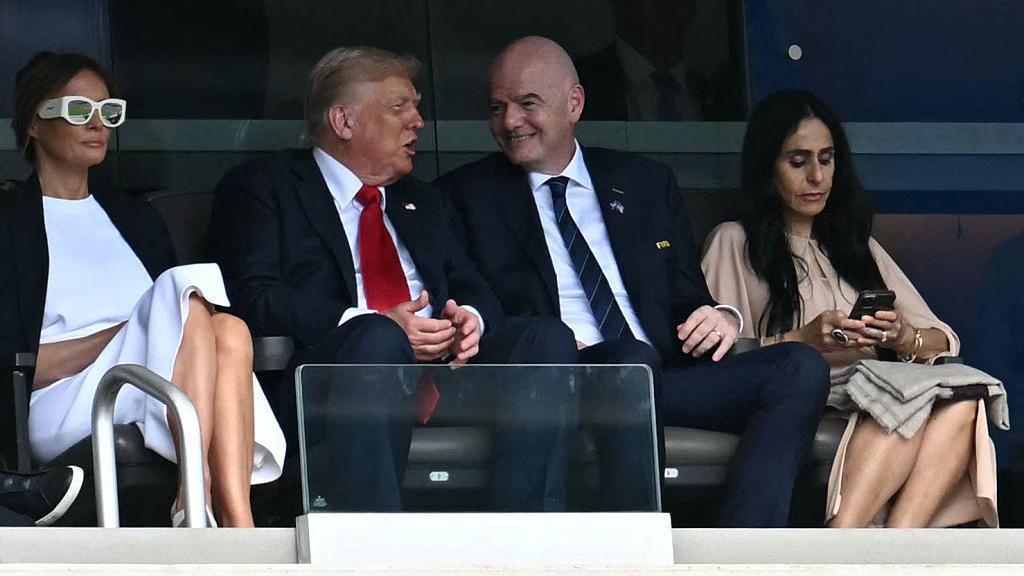 President Trump in conversation with Fifa president Gianni Infantino