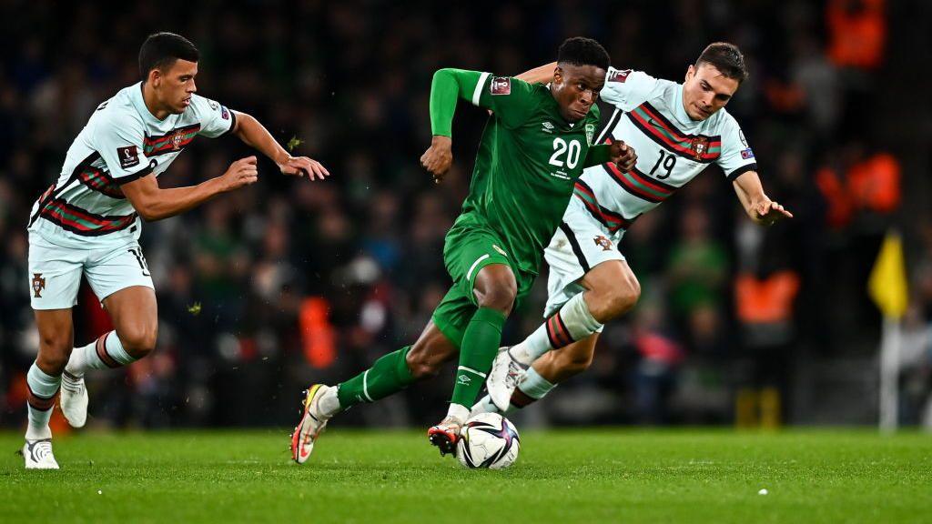 Chiedozie Ogbene in action against Matheus Nunes and Joao Paulinha