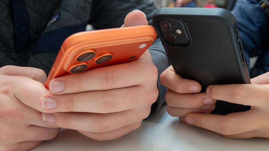 Young people seen using smartphones 