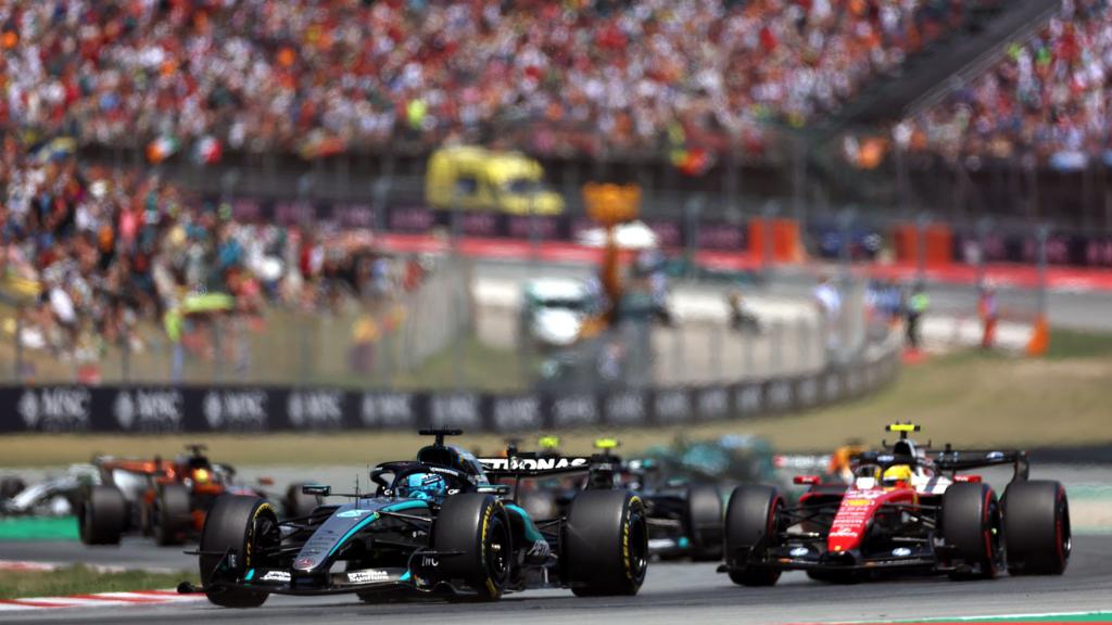 Mercedes' George Russell ahead of Ferrari's Lewis Hamilton in the early stages of the Barcelona-Catalunya Grand Prix