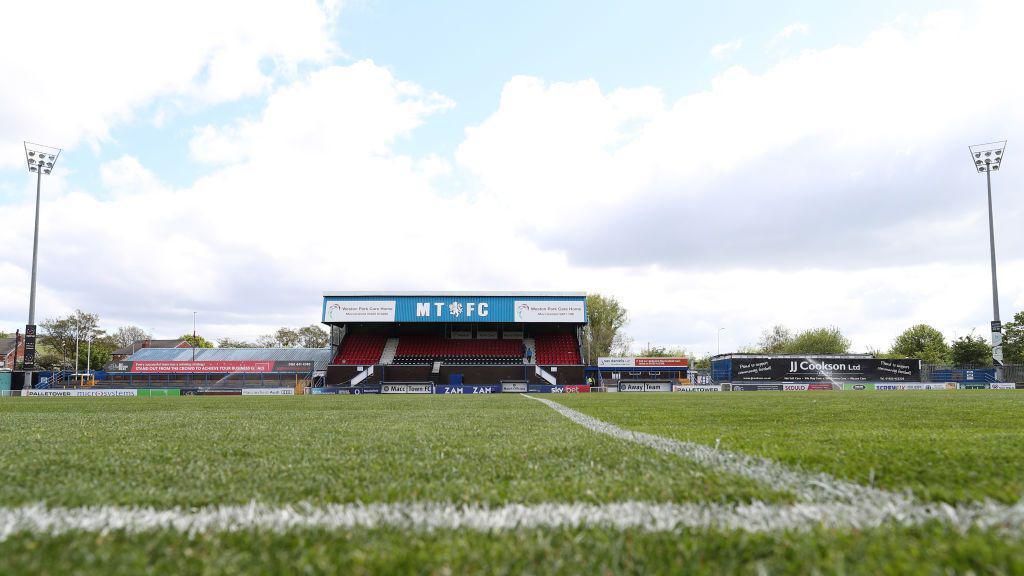 General view of Macclesfield’s home ground looking across the half-way line to the main stand.